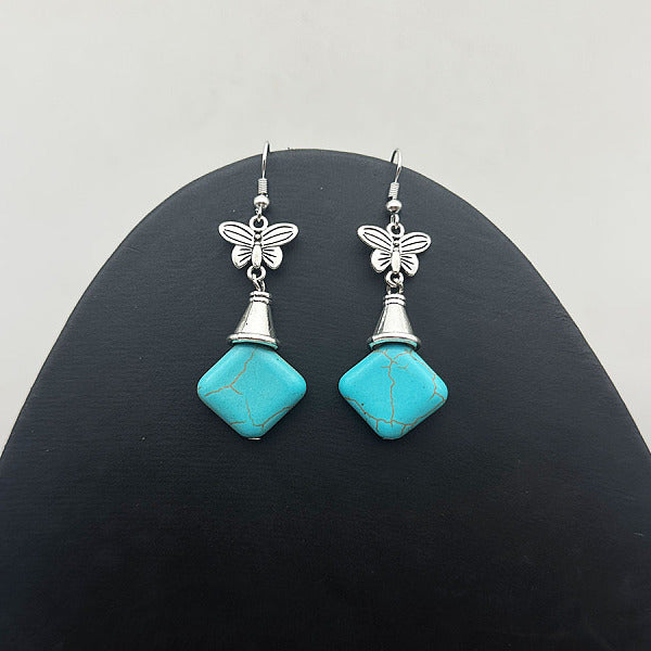 Boucles d'oreilles pendantes en losange turquoise synthétique et alliage