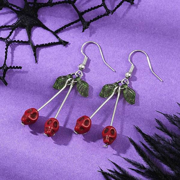 Boucles d'oreilles pendantes en laiton avec tête de mort en turquoise synthétique