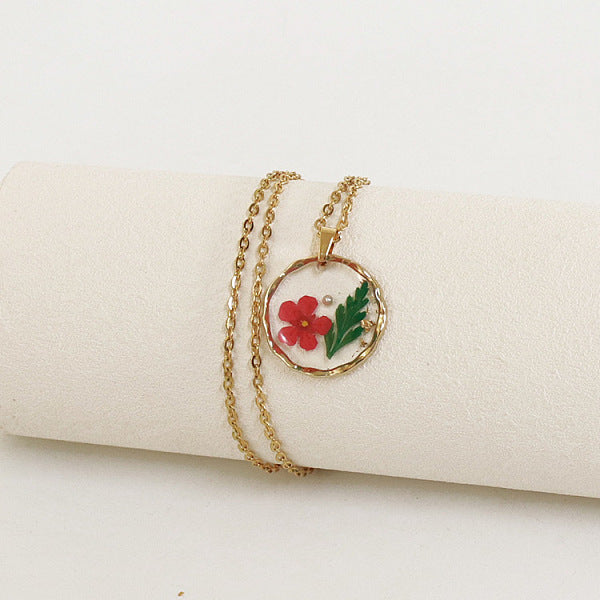 Collares colgantes redondos planos con flores interiores de aleación y plástico