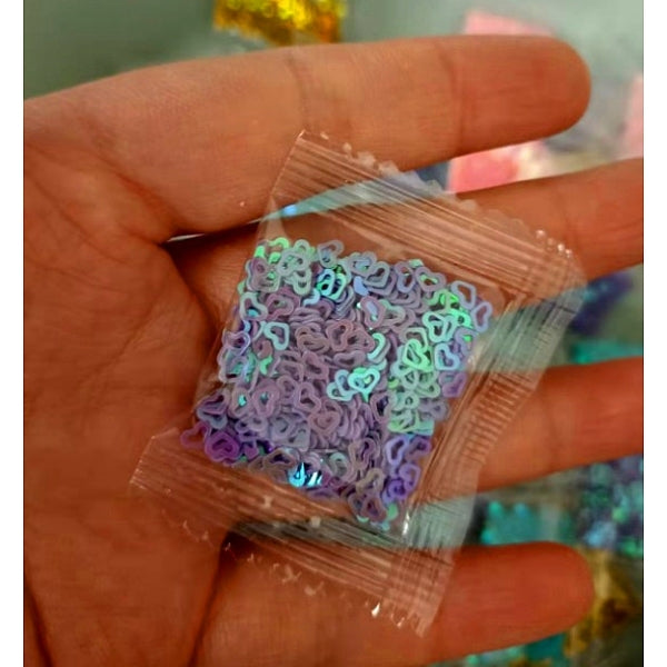Riempitivi in polvere glitter di plastica a forma di cuore