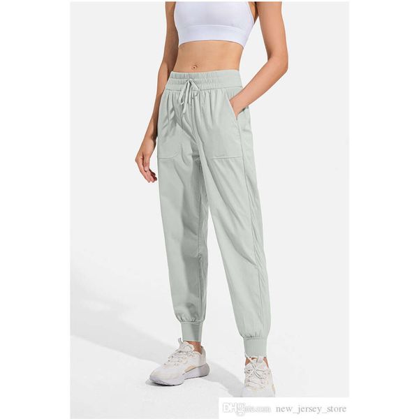 LL Women Jogging Yoga Ninth Pants Pocket Fitness Leggings Soft High Waist Hip Lift Elastic Casual Pants Drawstring Legs Sweatpants2344