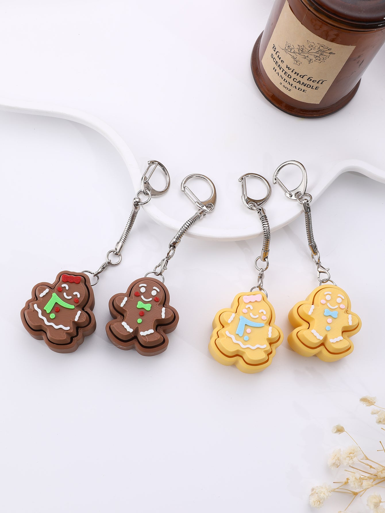 3D printed cookie-shaped keychain - an adult stress relief toy with a portable anxiety relief gadget featuring a clickable keyboard design