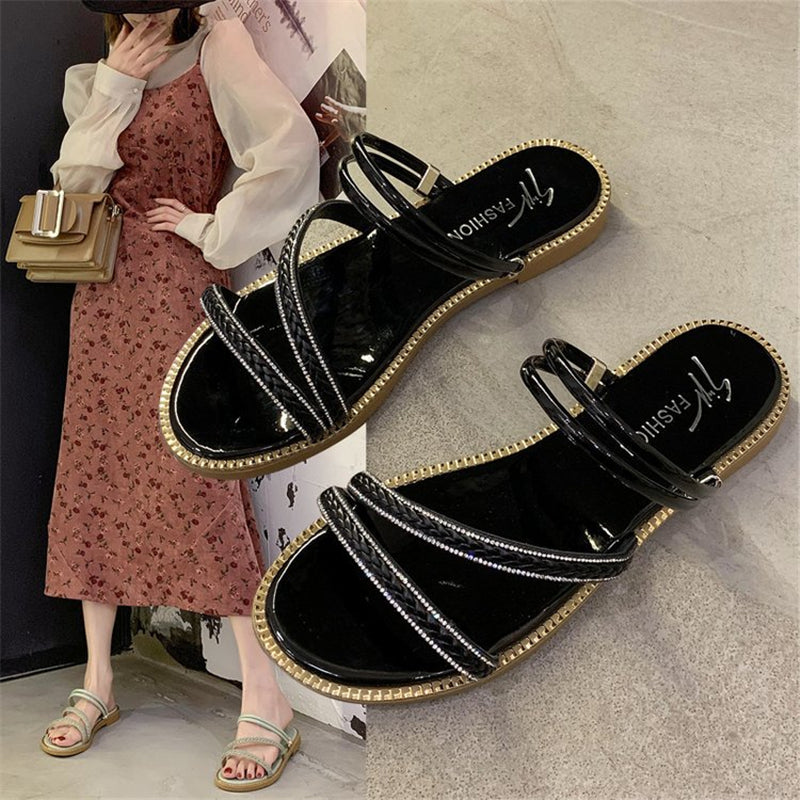 Womens shoes summer new flat-bottomed Korean version of the fairy style beach word with two casual sandals1