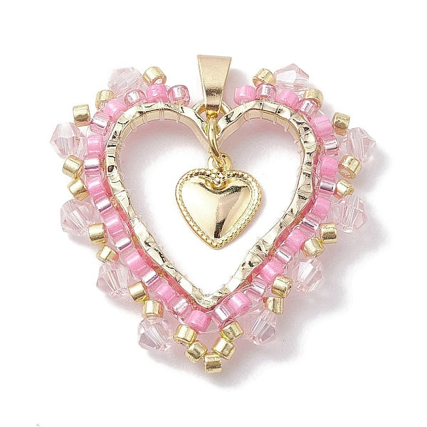 Pendentif coeur en verre de graine et alliage