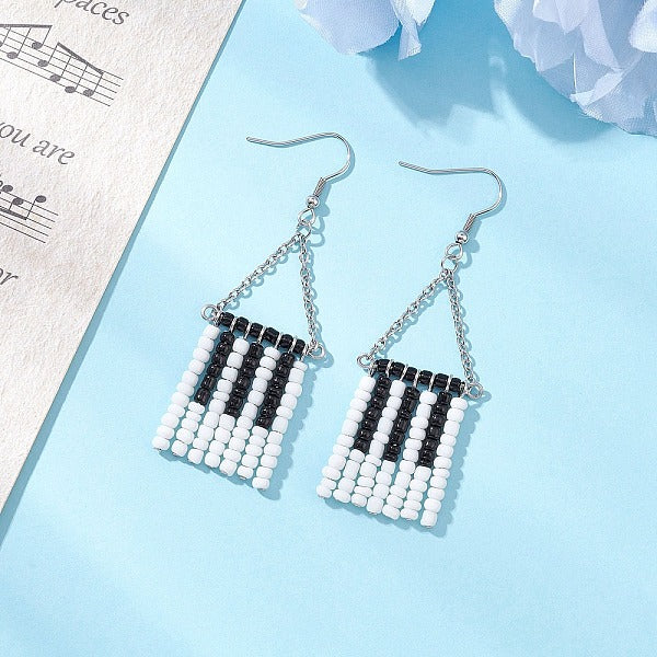 Boucles d'oreilles pendantes en perles de verre faites à la main