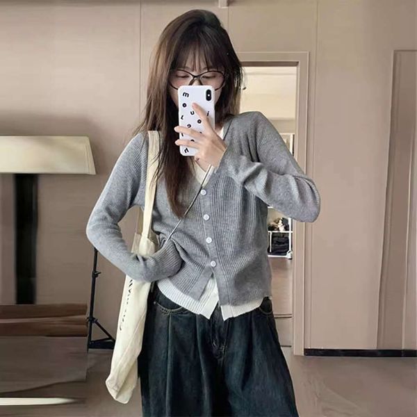 Small grey V-neck fake two-piece knitted cardigan women in early autumn, with niche design and a chic top for outerwear