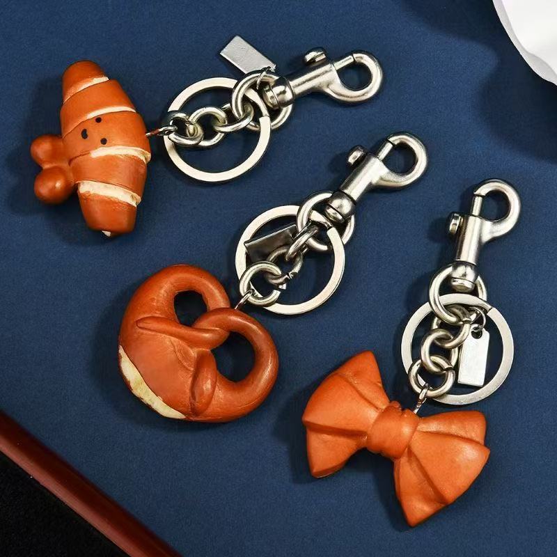 Pretzel pear Charm Women Letter Co ch Designer Keychain Cherry Keychain Bag Charm Decoration Accessory Co ch topiaKey Rings Cherry Resin Lanyards