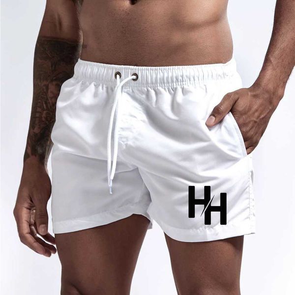 Shorts masculinos Moda de bolso de bolso masculino shorts impressos shorts academia de ginástica calças fitness calças frias fria