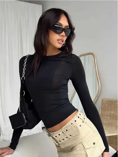 T-shirt de rastreio de nova feminina Slim Slim Fit de mangas compridas Casas de fitness yoga tampas de colheita com buracos de ginástica de