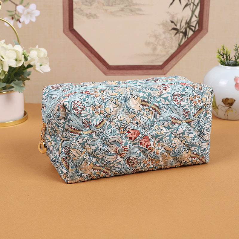 A524-AAAA Embossed small fresh lily flower cosmetic bag portable travel skin care storage bag