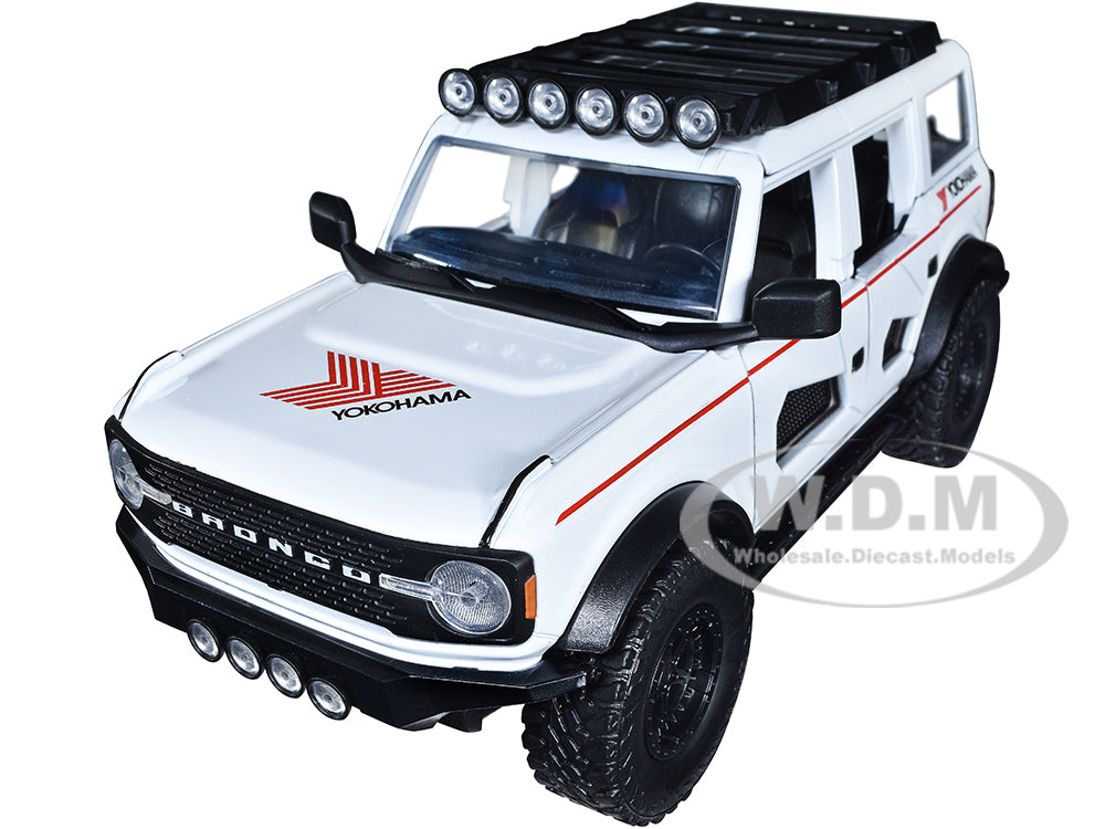 2021 Ford Bronco White with Red Stripes and Roof Rack "Yokohama Tires" "Just Trucks" Series 1-24 Diecast Model Car by Jada