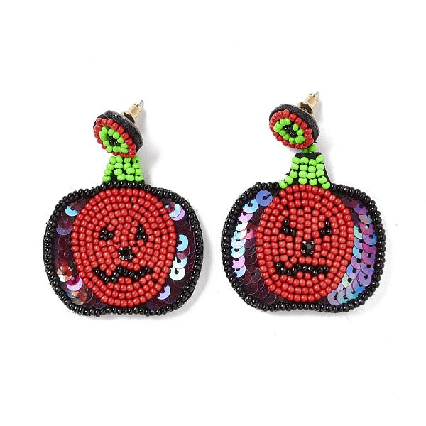 Boucles d'oreilles pendantes tressées en graines de verre de citrouille d'Halloween
