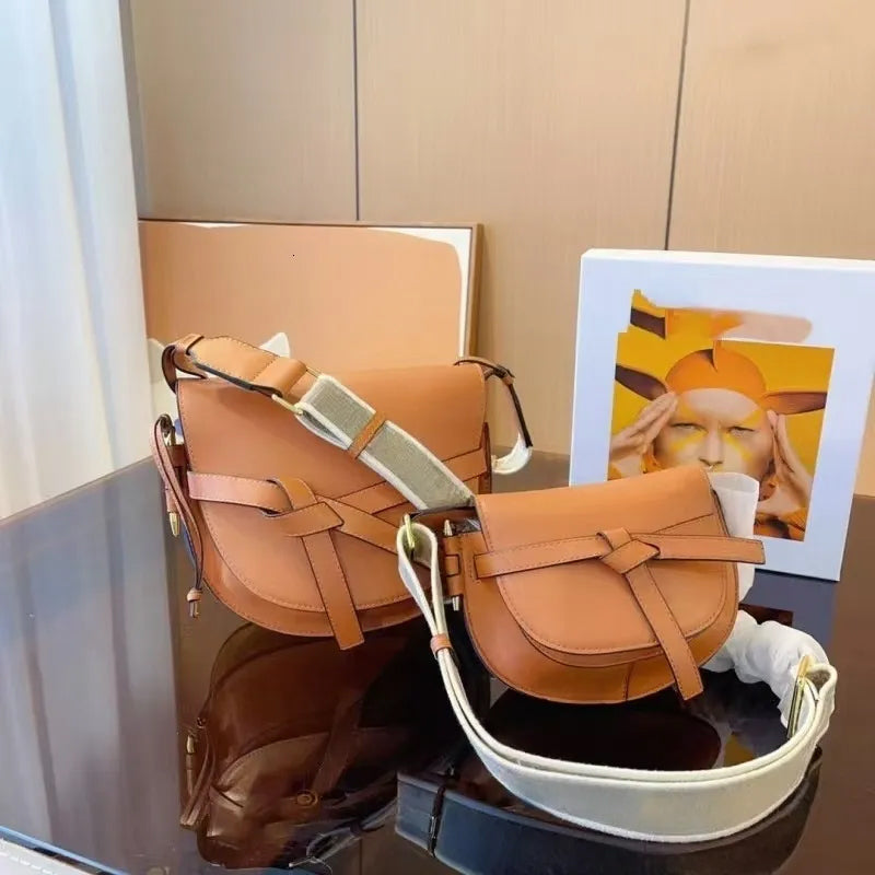 designer bag Saddles Women&#039;s Shoulder Handbag High-end Real Cowhide Bow Clamshell Wallet Fashion Alphabet Broadband Sub Crossbody Bag