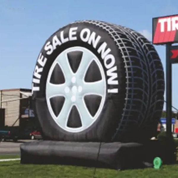 wholesale Commercial use with blower giant inflatable tire balloon model customized car wheel on truck for advertising