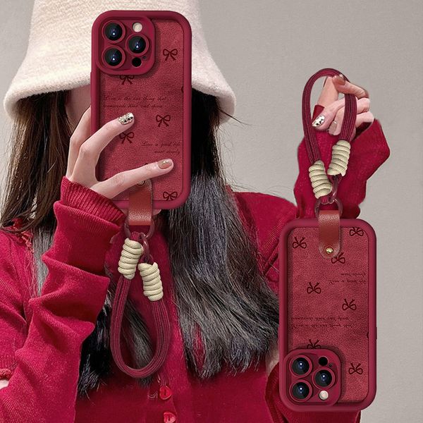 Simplified red lanyard phone case suitable for 16 Pro Max 15 protective case 14-13 soft case 12 New Year&#039;s