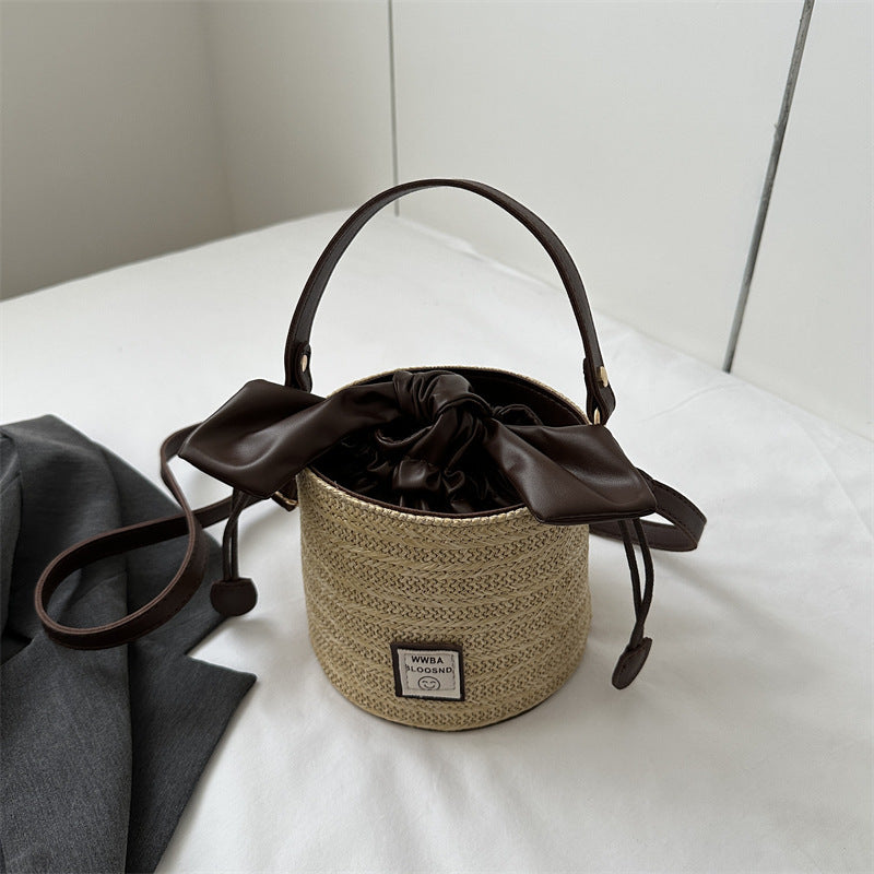 Designer handbag women&#039;s men&#039;s waist cross shaped handbag new woven grass tote bucket women&#039;s high-end texture small crossbody bag
