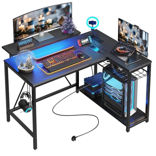 Bestier Gaming Desk with Power Outlets, 42" L-Shaped Computer Desk with LED Lights, Desk with Reversible Storage Shelves & Hooks for Small Spaces, Bed