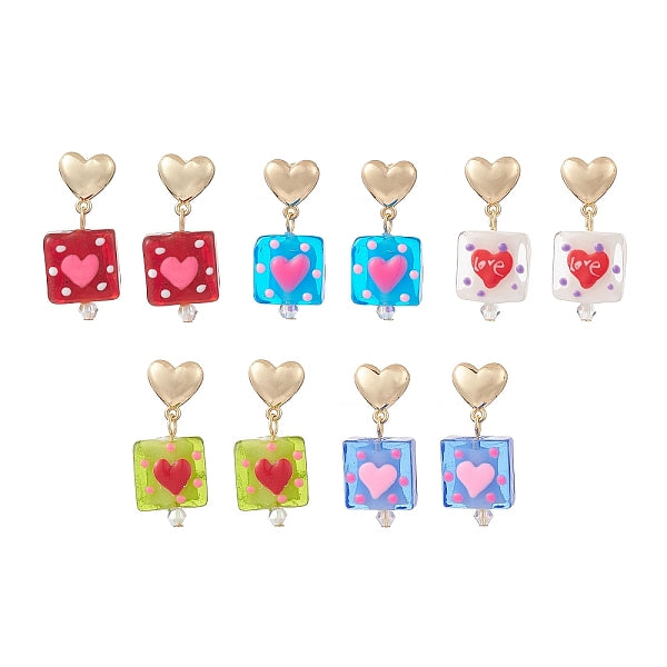 Rectangle au chalumeau fait à la main avec des boucles d'oreilles pendantes en forme de cœur