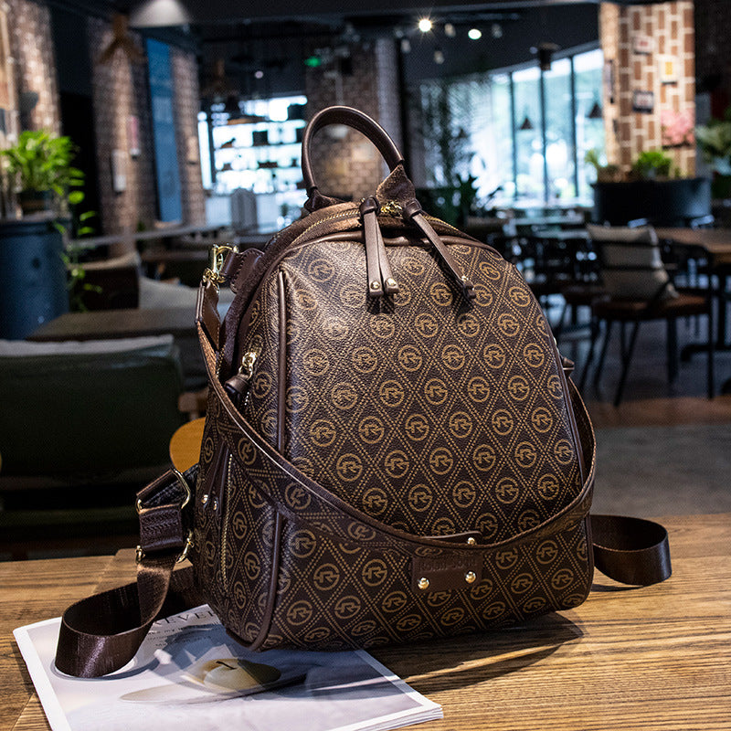 Factory sales shoulder bag 2 styles multifunctional padded leather leisure travel backpacks simple polka dot printed handbag Joker women backpack 12