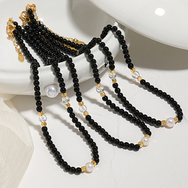 Elegantes collares redondos de ónix negro natural (teñido y calentado) y perlas de vidrio y agua dulce.
