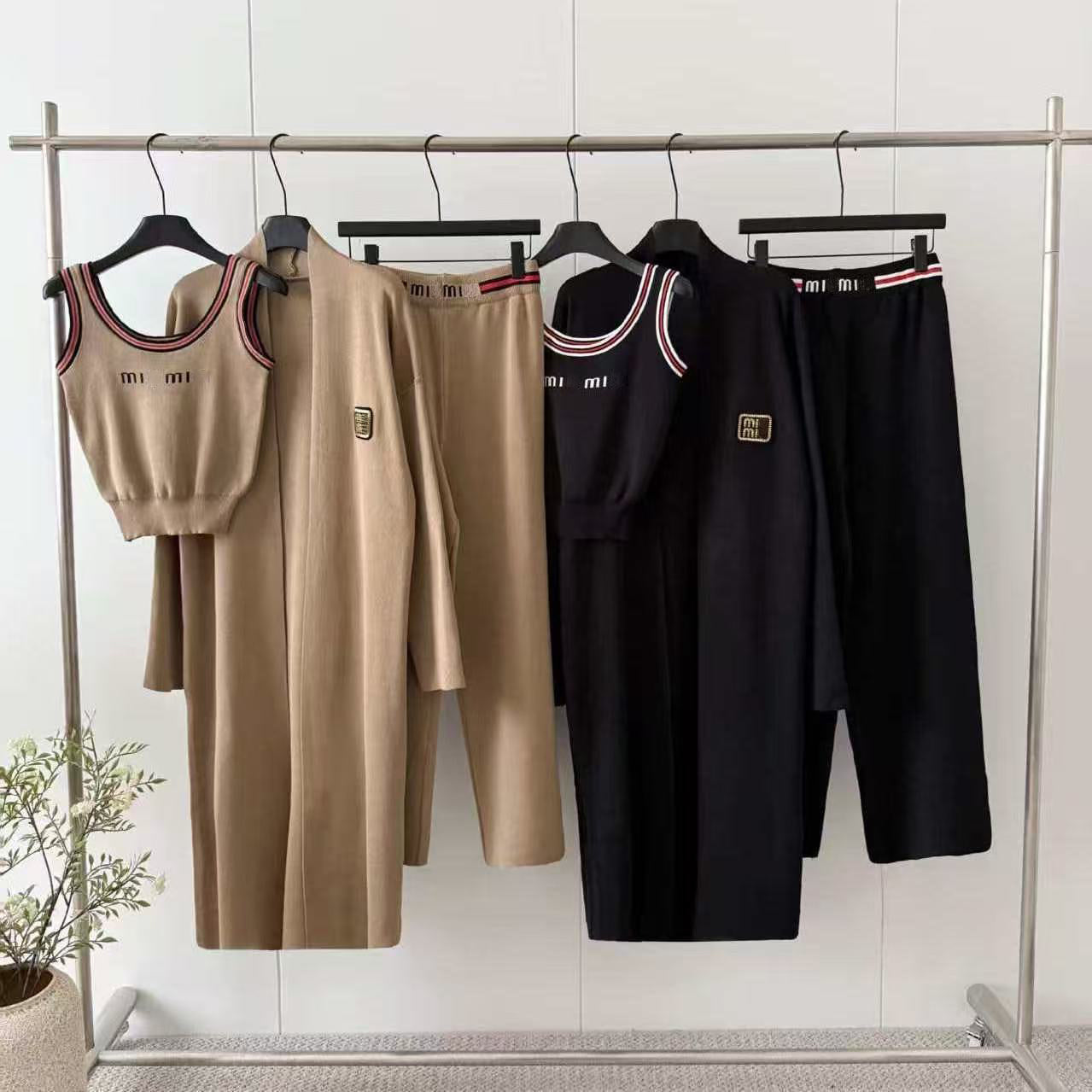 Fashion women&#039;s autumn and winter leisure lazy knitting long cardigan+contrast sling+high waist wide-leg pants three-piece suit