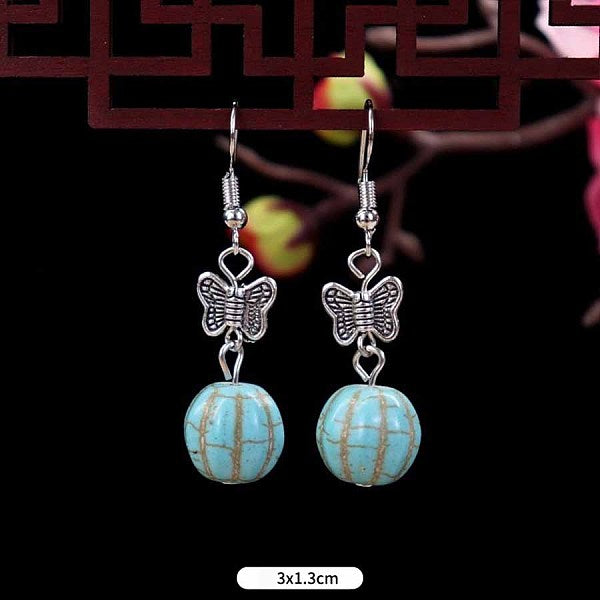 Boucles d'oreilles pendantes rondes en turquoise synthétique et alliage
