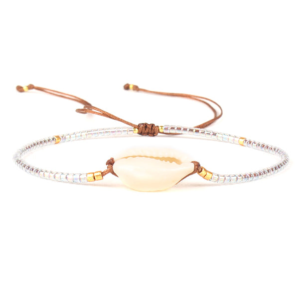 Bracelet de perles tressées en cauris naturels et graines