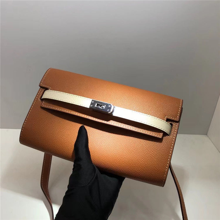 The first layer of cowhide clutch, makeup bag, leather headphones, lipstick, storage wallet, women&#039;s large capacity wallet