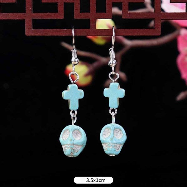 Boucles d'oreilles pendantes en turquoise synthétique et alliage tête de mort