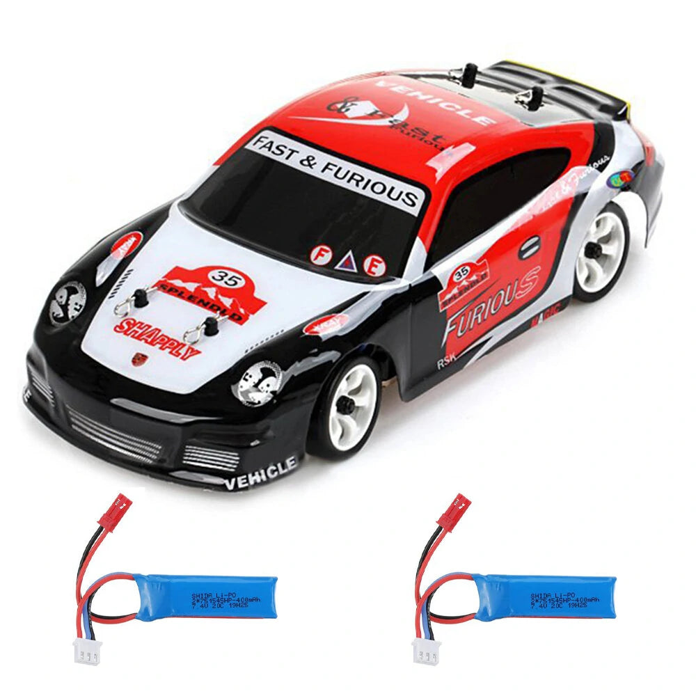 Wltoys K969 1-28 2.4G 4WD Brushed RC Car Drift Car Two Battery 7.4V 400mAh