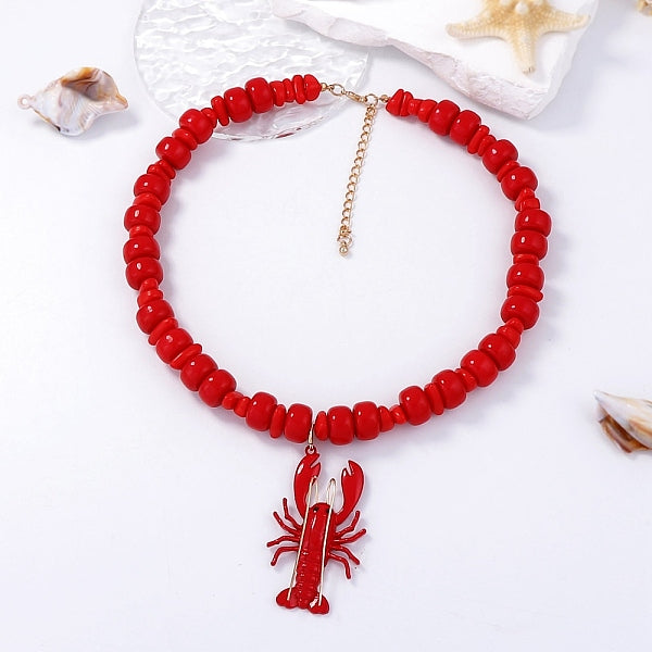 Collares de cuentas con colgantes de langosta de plástico y cadenas de aleación en los extremos.