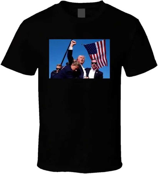 Trump swings bloody aerial fist on rally shooting T-shirt X241107