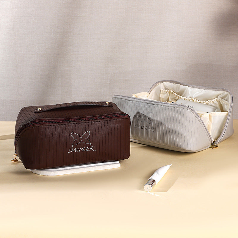 I413 A4 New cosmetic bag portable skin care product large capacity pillow bag