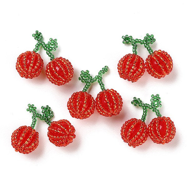 Pendentifs en perles de verre et de graines