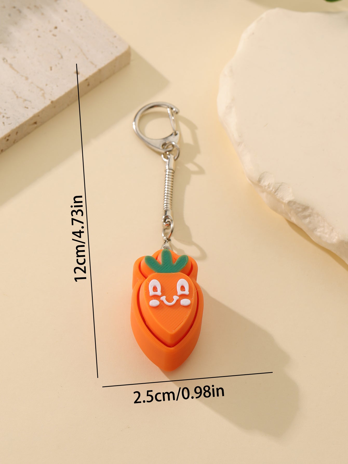 3D printed carrot keychain - an adult stress relief toy with a portable anxiety-reducing gadget featuring a clickable keyboard design