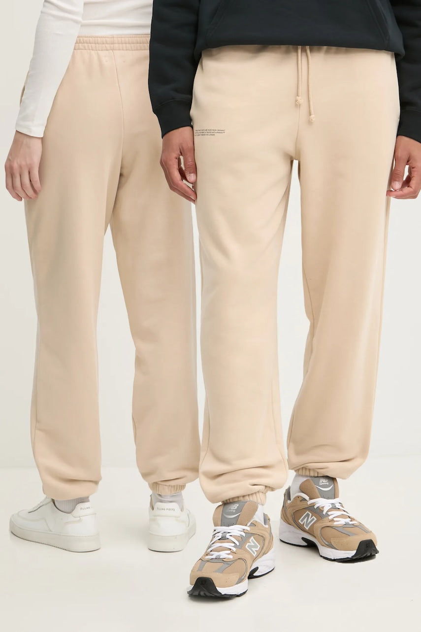 Pamučni donji dio trenirke Pangaia boja: bež, bez uzorka