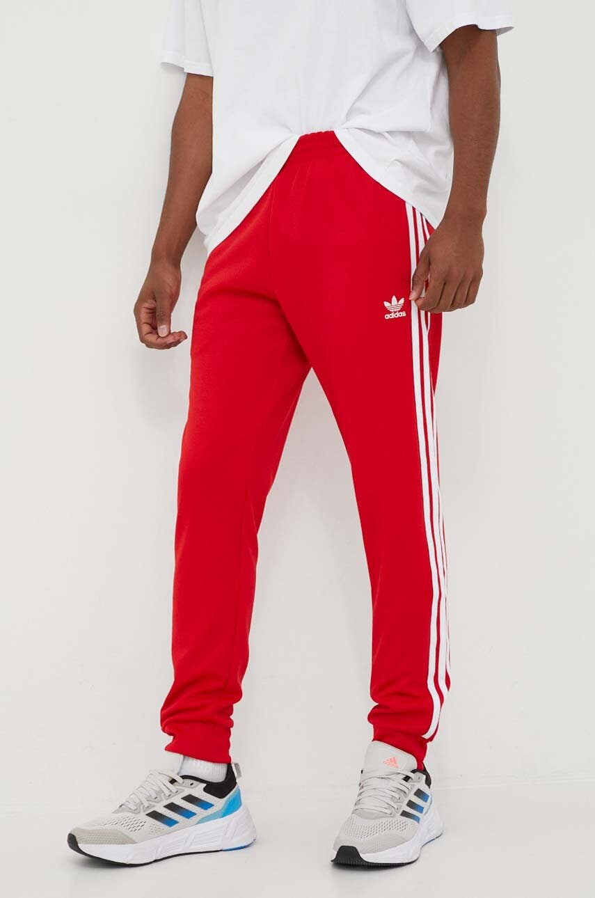 Spodnji del trenirke adidas Originals Adicolor Classics SST Track Pants rdeča barva IM4543