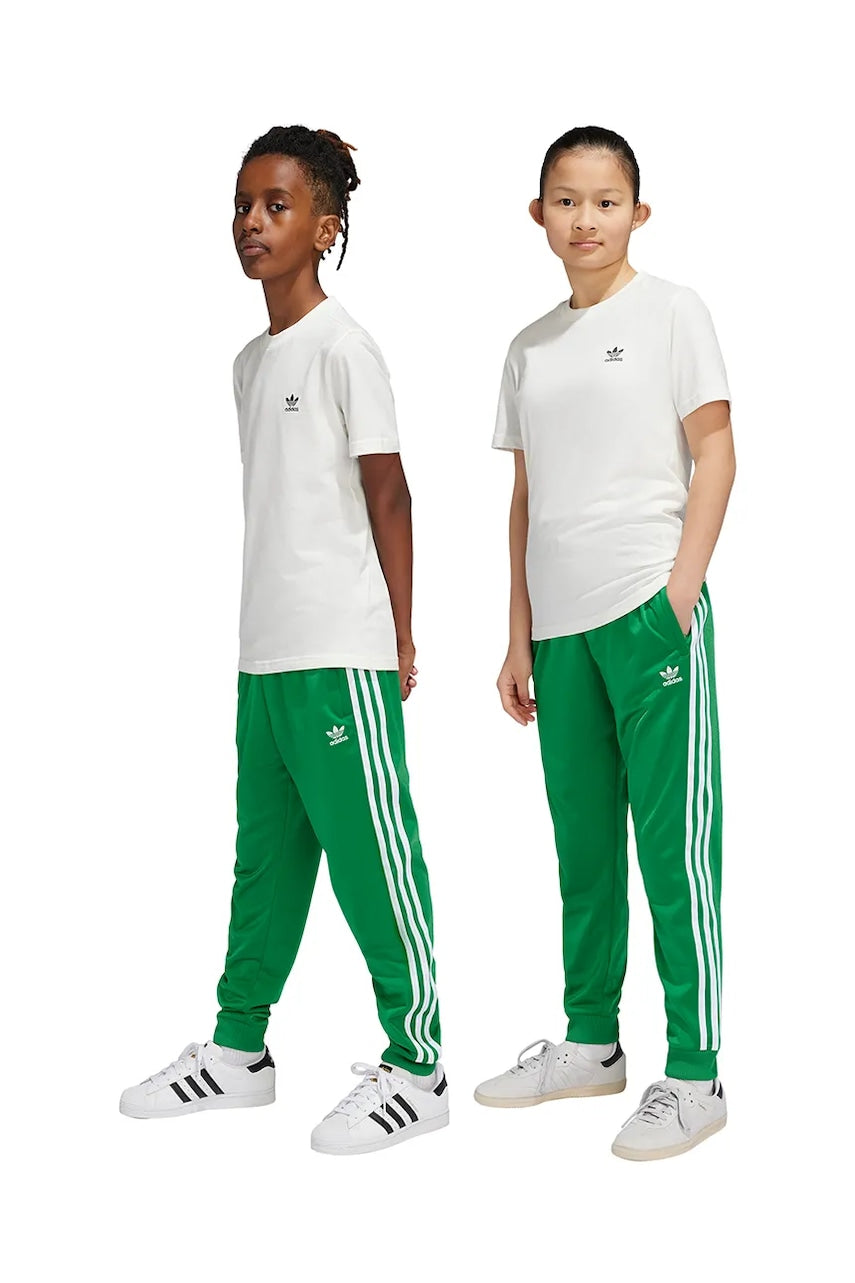 Otroški spodnji del trenirke adidas Originals SST TRACK PANTS zelena barva, IY7461