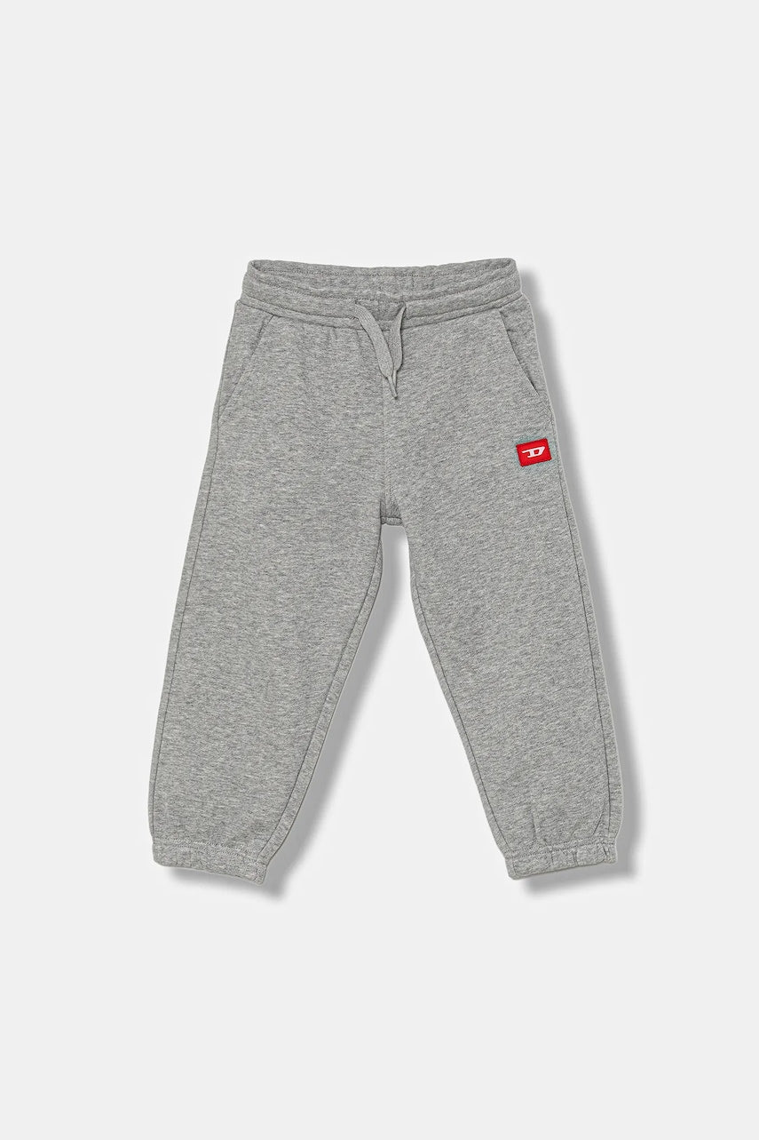 Otroška bombažna trenirka Diesel PXGIN TROUSERS siva barva, J02461