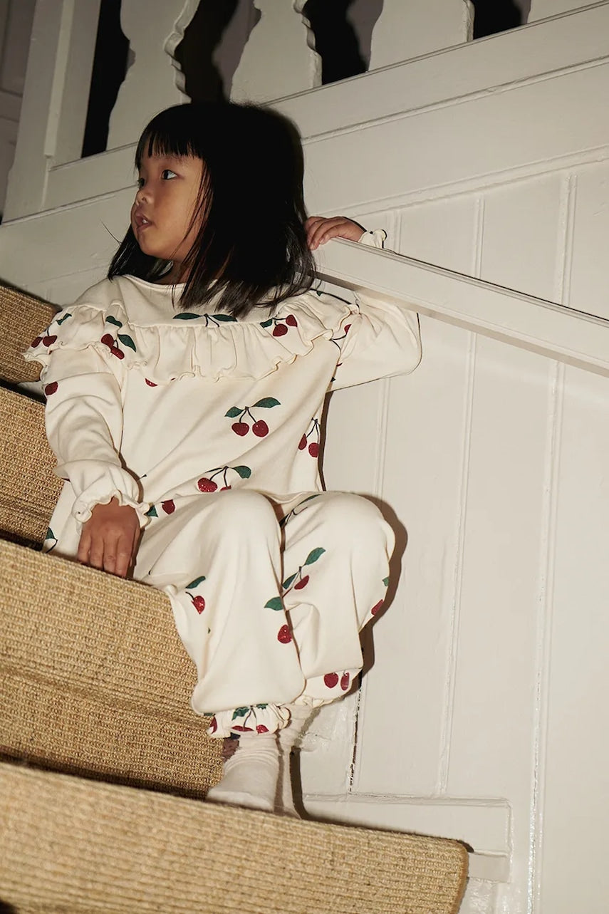 Otroška bombažna trenirka Konges Sløjd MALLI GLITTER PANTS GOTS bež barva, KS103894