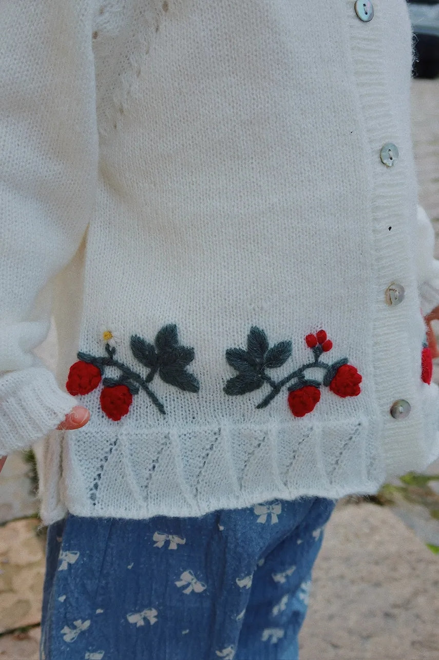 Otroška jopica Konges Sløjd MINIA FRILL CARDIGAN bela barva, KS103913