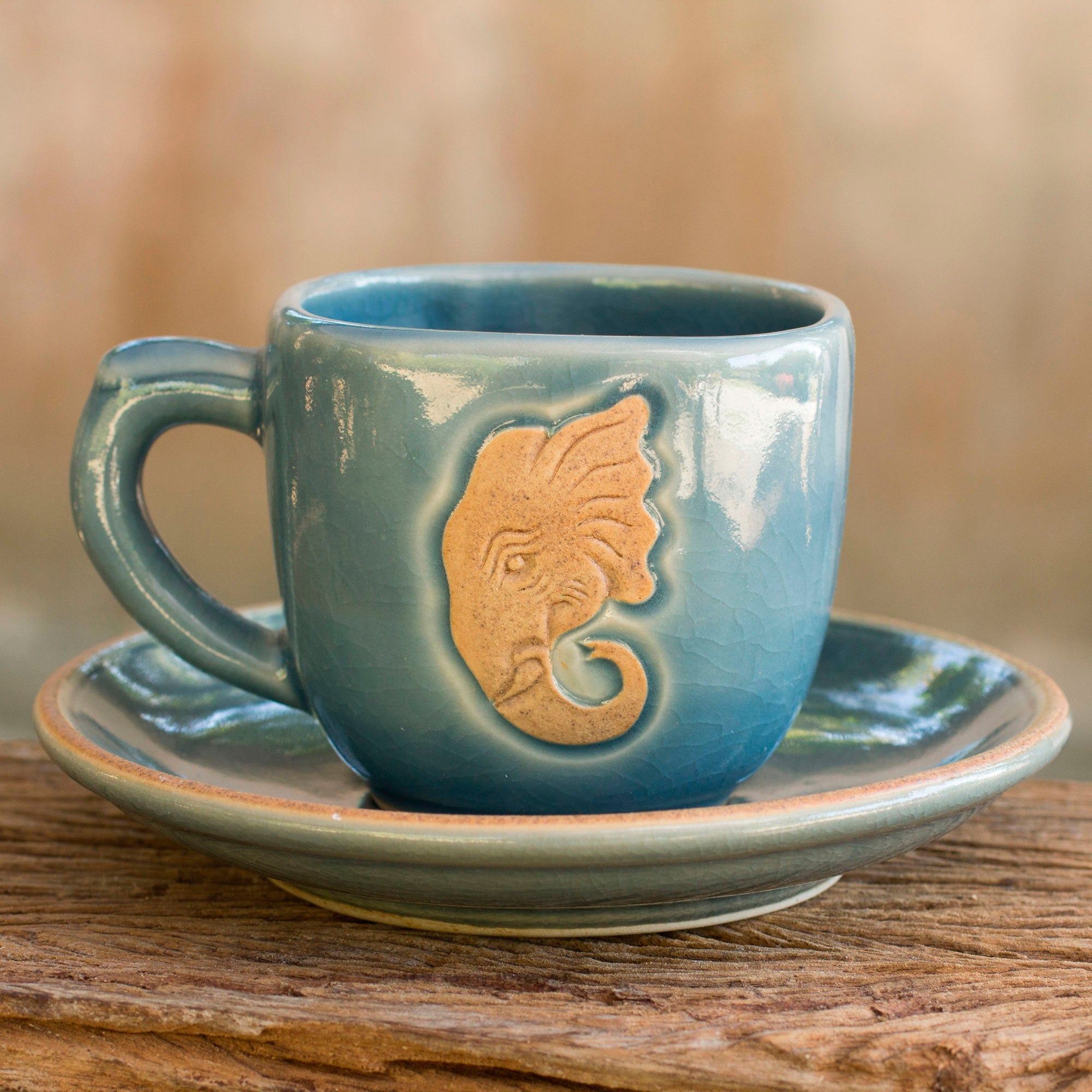 NOVICA Blue Thai Elephant Thai Blue Celadon Elephant Cup and Saucer Set