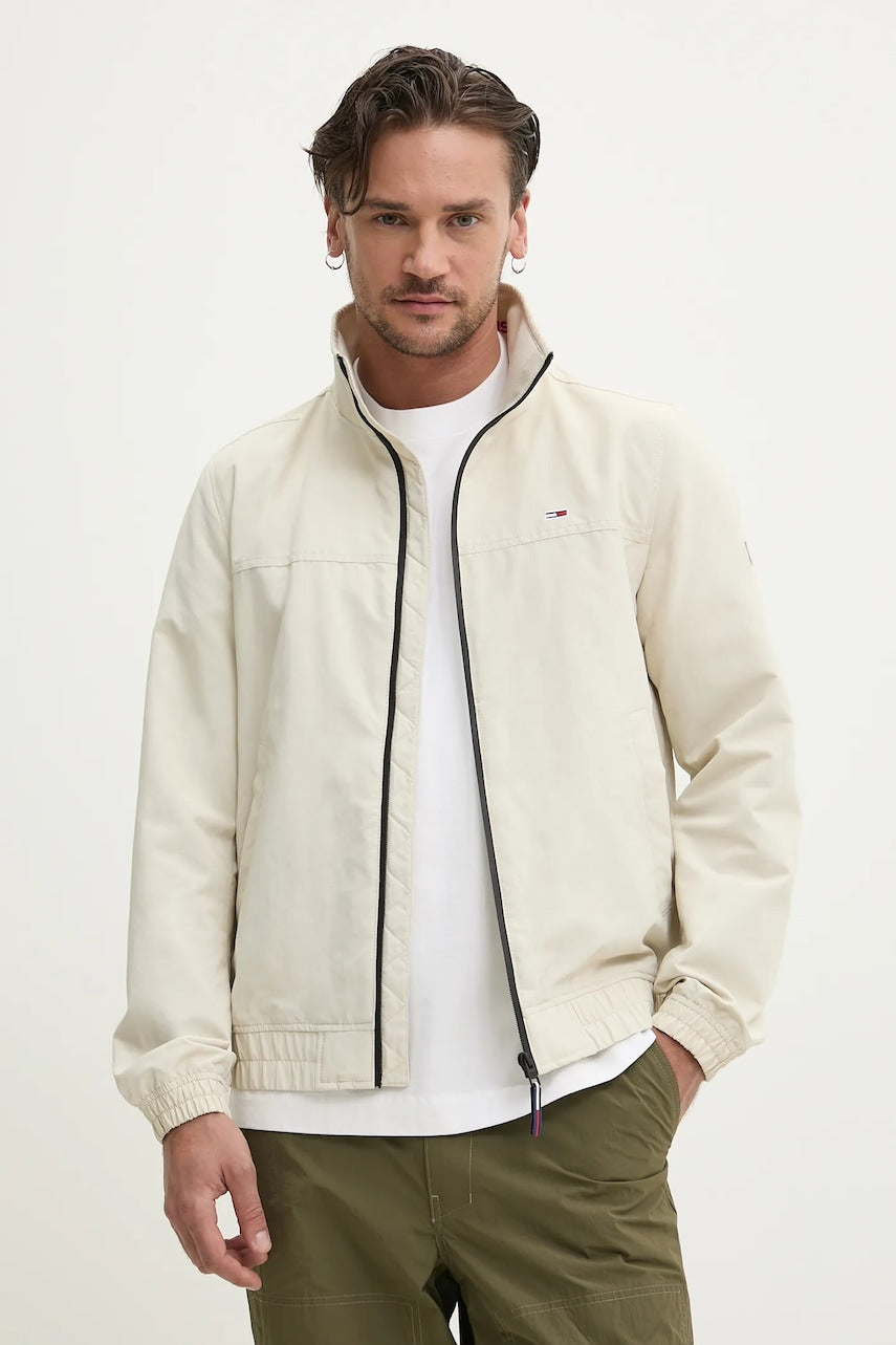 Jakna Tommy Jeans boja: bež, za prijelazno razdoblje, DM0DM15382