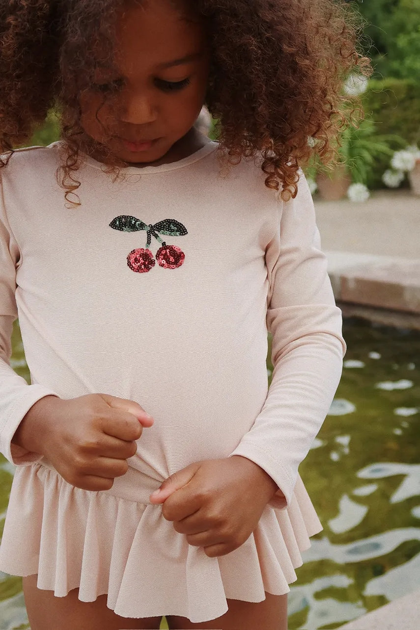 Enodelne otroške kopalke Konges Sløjd JADE LS SWIMSUIT bež barva, KS103040