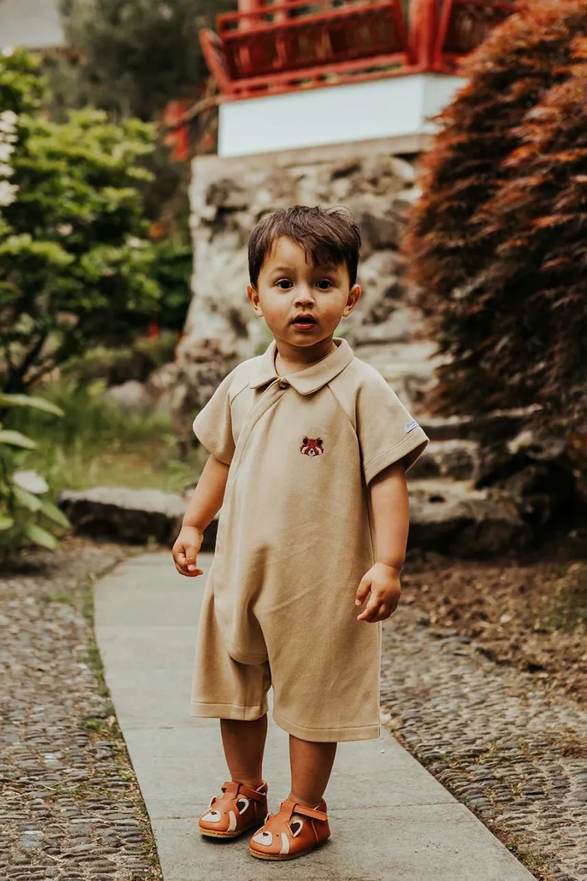 Pamučni kombinezon za bebe Donsje Adriaen Playsuit Red Panda 3035602