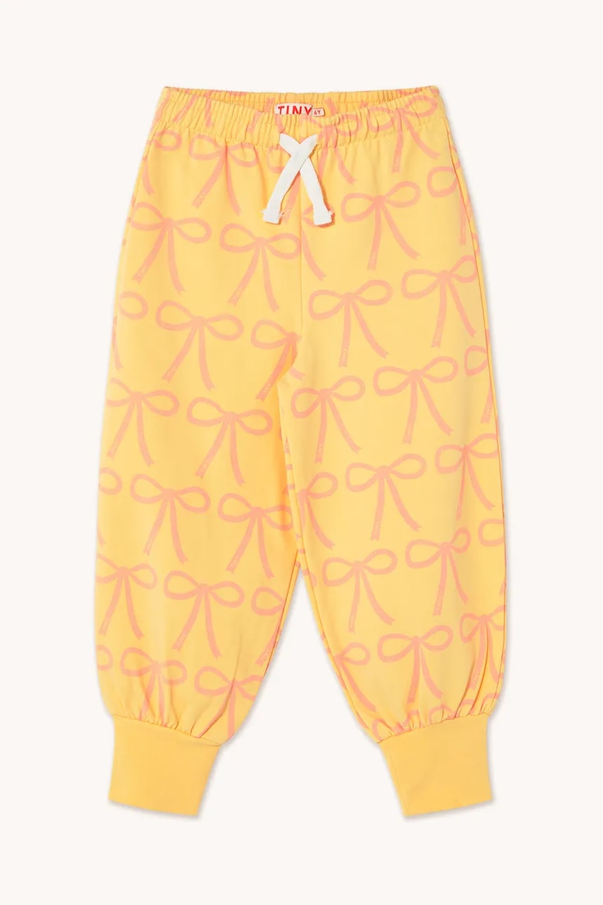 Dječji donji dio trenirke Tinycottons BOWS SWEATPANT boja: žuta, s uzorkom, SS25-057