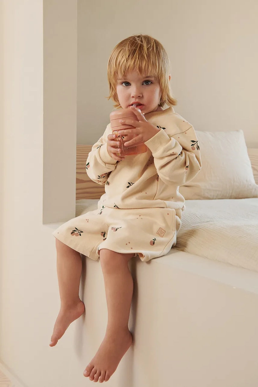 Otroške bombažne kratke hlače Liewood Gram Printed Sweatshorts bež barva, LW19864