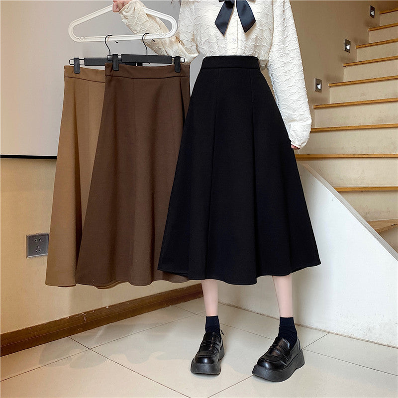 2025 autumn and winter Korean version of versatile woolen swinging umbrella skirt high waist ins super fire A-shaped skirt skirt skirt
