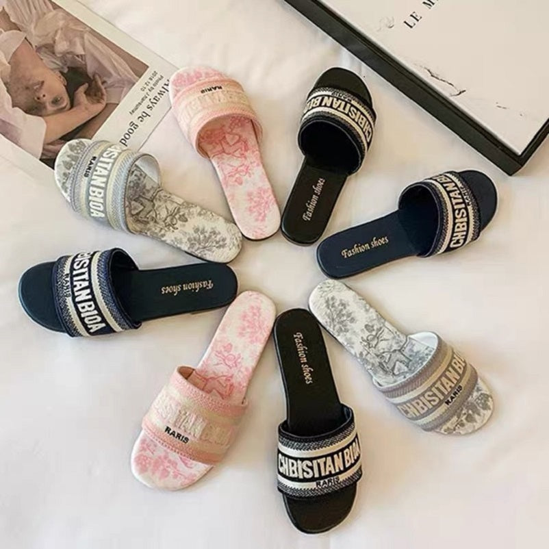 Designer sandals slippers women&#039;s outerwear flat bottom one word drag embroidered small fragrant letters beach shoes ins temperament shoes