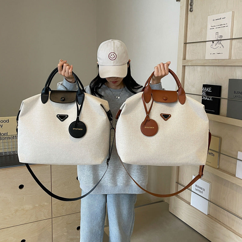 Designer bag 2025S new short distance large capacity fitness women high-end feeling lightweight luggage travel bag outdoor handbag